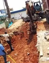Excavation for drainage construction beside a road