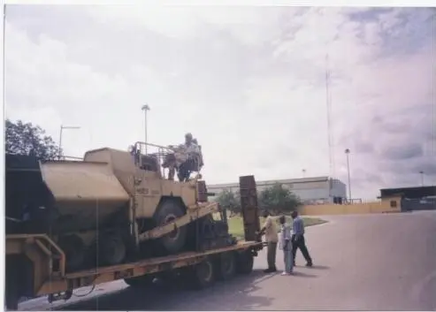 Heavy equipment being transported on a trailer